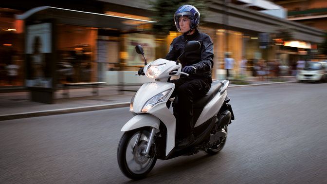 Honda Vision 50 Scooter Rider Girl